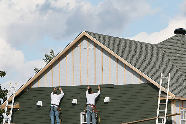 Professional Siding technician working in New Castle, IN